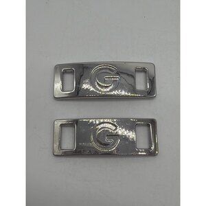 Guess Silver Metal Shoelace Emblems Set Of 2 With "G" Logo Design